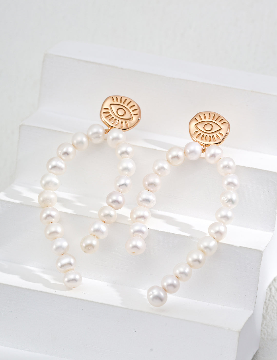 Topo Revive Mystic Eye Pearl Cascading Half Drop Earrings